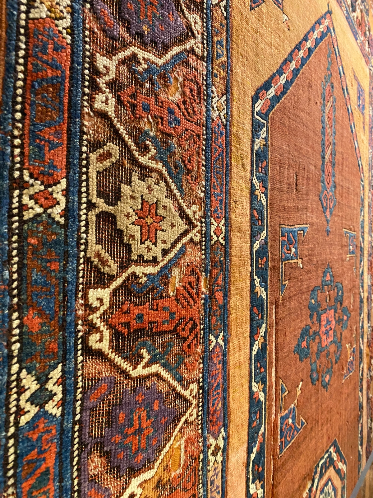 What is root dye for hand-woven carpets?